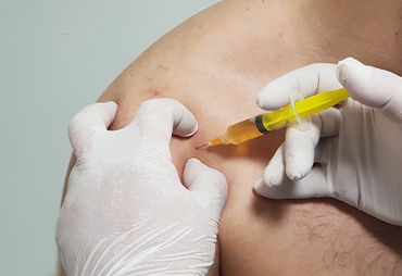 patient receiving PRP injection for knee pain
