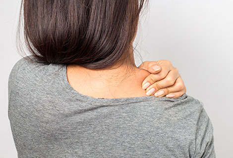 patient suffering with shoulder pain