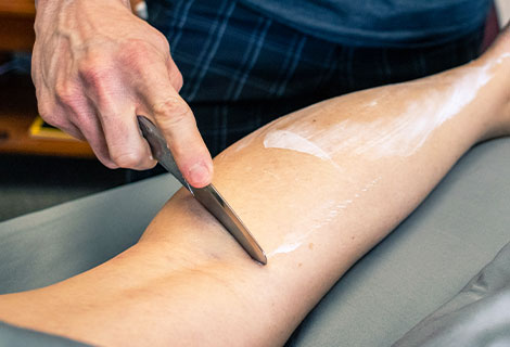patient getting iastm treatment in Fort Worth TX